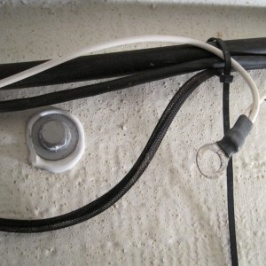 Forgotten gas tank grounding lug.