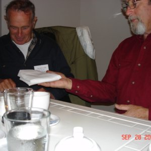 Serious business here! 
Joe (R-MATEY) and Barry (C-CAKES) showing how they used to fold newspapers for their paper routes.
