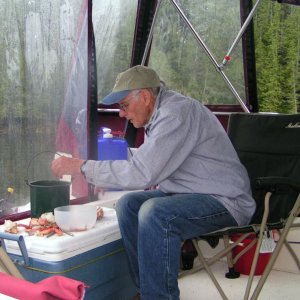 Dave Olson shelling crab at Claydon Bay 6-13-06
