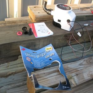 Ultima bilge pump, opened package, includes all parts and instructions, package insert.