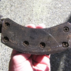 Media 'Starboard side front wheel, exterior pad.' in album 'Brakes need replacing.'