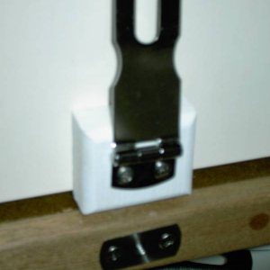 Stainless steel hasp with the TyBoo gizmo below. The threaded female section is for the knob that locks chair in place.