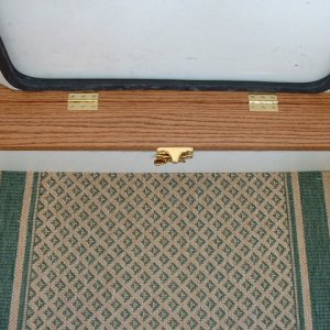 Moved my bilge pump location to this compartment that I built. The old location (starboard side of centerline at the aft bulkhead/cockpit deck joint) just never worked well. I installed a new Rulemate 1100gph pump with auto/manual switch.