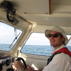 Media 'Fin at the helm in the ocean (huge tanker in background).' in album 'Test Ride'