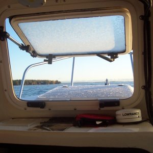 Frosty morning outing. Its hard to scrape the center window from inside the cabin.