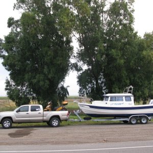 Toyota Tacoma V6 towed it just fine from AZ to WA