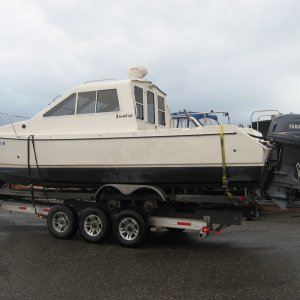 Piggy-backed on a larger Float On trailer