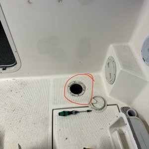 Hole in cockpit deck improperly sealed.