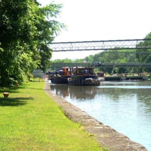 22.) Tug and barge exiting lock 28A