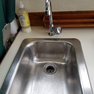 Galley sink with new faucet
Installed with electric pump