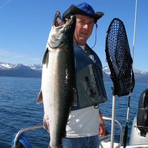 The trick is to hold the fish way out in front of you toward the camera.  They look much bigger that way.