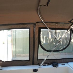 interior showing frame and mounts as well as zippered pockets for bows and panel installation (strataglass on rear and Regalite on front purchased through Sailrite).