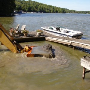 Media 'This about the only pic I can find of my "beater" a 1988 Rinker.  We call it the Dog Boat.  We had a bit of dredging in 2007.' in album 'Cedar Strip Canoe
My first boatbuilding project.'