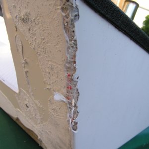 Some damage to the gelcoat.  Couldn't be avoided as this was the first side I started working on.  Better this than the hull.