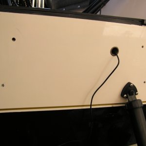 Nice and clean.  Some "GOOF-OFF", a single edged razor & elbow grease did the trick.  Very minimal damage to the gelcoat; a few scratches but nothing major.  Now to repair the holes & re-gelcoat prior to kicker install.  The wire for the transducer will also be properly installed; I didn't want it to interfere w/ the Mini-Jacker.