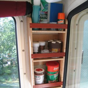 Spice/gear rack through-bolted on side into head/shower.