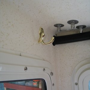 Installed two double brass robe hooks in head/shower for hanging up raingear etc.