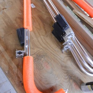 I slid some pool noodles onto the 1\" tubing for cushion.