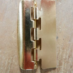 Mounting tab cut off to match cabinet edge depth