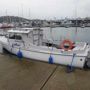 Not sure what kind of boat this is, but looks seaworthy enough to cruise anywhere in the world!