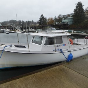 Not sure what kind of boat this is, but looks seaworthy enough to cruise anywhere in the world!