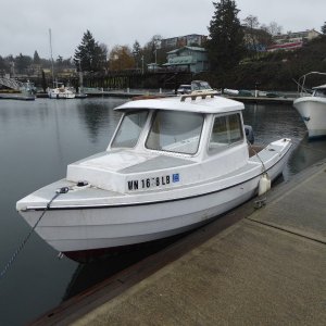 16 Angler in Friday Harbor Dec. 2016 - appears to have never had a hatch installed, and no color stripe. Was this a bare-bones model used in a rental fleet perhaps?
