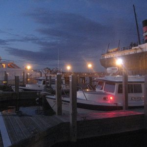 Kemp Marina at night. Not-For-Hire and the freighter Valley Camp in background.