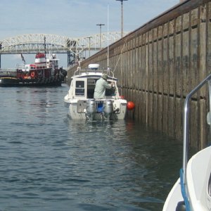 Mark/Not-For-Hire, keeping her steady upbound in the Poe Lock. (The Poe lock is 366 meters (1200 feet) long, 34 meters (110 feet) wide and 10 meters (32 feet) deep.