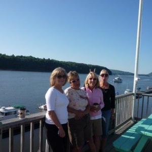 The Devil Sisters Becky, Paula, Ginny , Jess in Winterport Me. Friday the 13th of August 2010. Ginny getting the cootie sign from Jess, she's a bad one!