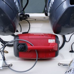 Media 'Gen Mount 011 - Engines clear generator in all positions - -
2014 UPDATE - When the platform was built, the boat had Yamaha F50's. We have since repowered with F70's. I feared that the slightly different shape of the F70's cowlings would prevent full tilt with the gen on the shelf, but it's not a problem!  Good to go.' in album 'Gen Mount 001'