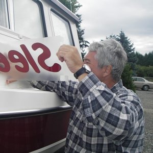Laying on the decal takes both hands and no breeze.