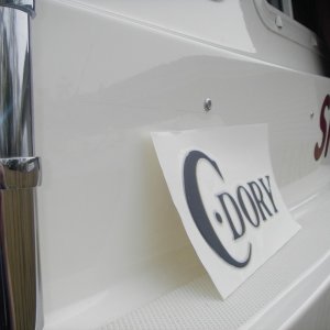 Finally get to make it an "Official C-Dory".  Probably came with the old style decals but were removed by Jim to mount the rod holders.