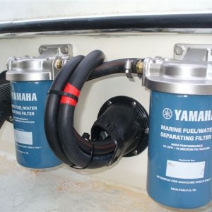 Media 'Stainless Steel Jumbo 10Micron Water Seperators....fuel lines routed thru engine control connection lines' in album 'Rear helm--  4 K Radar - Furuno Remote Auto Pilot'