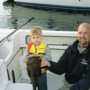 {R/J} Catch of the day!
Jack & his fish with dad Jeff Messmer
(FaCDORY Guys).