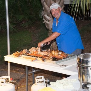 Media 'Dave, the Honda rep was an expert on cooking the pig!' in album 'Because of the fun that all of this had this year at Apalachicola, watching the dogs--this is the title photo!'
