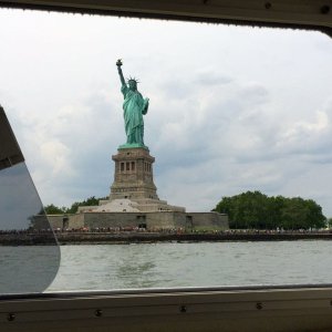 Our first photo of many of the Statue of Liberty from our boat!