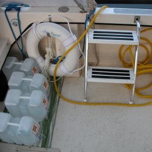 First morning on Sea Angel and deck inventory messy, but there. Full water tank, 4ea. 2 1/2 gal water jugs & 2 cases on the V-Berth; that should be enough weight to keep the water line, and bow down.
Thu 01 Jun 2006 06:19:16 AM CDT