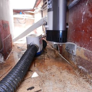 Backup bilge pump mounted a couple of inches above main pump.  Aluminum angle used for mounting shelf.