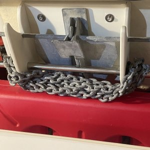 .the anchor drops in and holds securely... it pops right out when needed in a hurry...