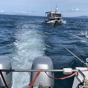 CD 22 Hunkydory towing Ranger Tug 25 across Strait of Juan De Fuca to Sequim