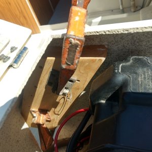 Slathered on some 5200 and clamped it into place.