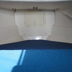 Old Lazerette cover is fine inside,  Keeps the mucky anchor rode away from the berth