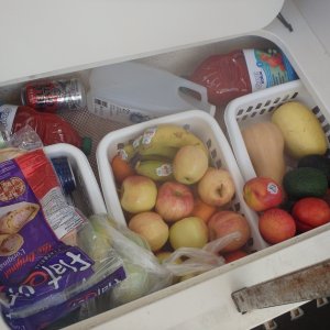 Media 'Under the table keeps food cool' in album 'Under the sink and stove'