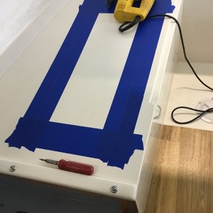tape on each side of planned cut.