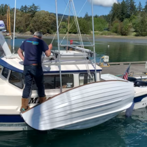 Media 'Loading dinghy on roof' in album 'Headed to Sucia'