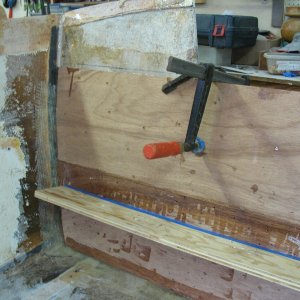 feb. 2011 046 lower half w/temporary screws thru original transom skin inside and outside