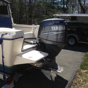 I had the top cowling sanded and repainted. I then added OEM Yamaha decals to it. Looks amazing.