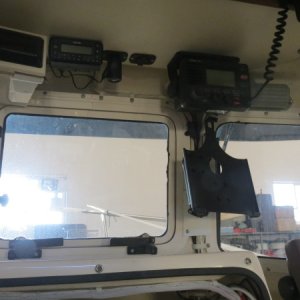 Stereo, Sirius Radio, twin 12 V outlets and iPad mount added to helm.