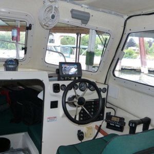 Media 'Newly installed Standard Horizon GX2150 (w/ AIS receiver).  Also installed a Caframo Bora 3-speed fan (one of the few fans not made in China).' in album 'Jean Marie in her home port, Sportcraft Landing in Oregon City.  She's a documented vessel, so hailing port is a required marking. No state registration numbers and I like the clean look on the bow.'