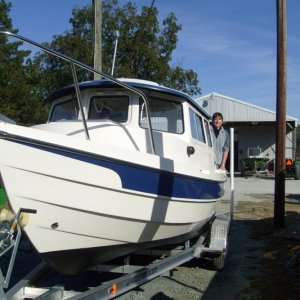 The Captain on Sea Baby at Mobile East Marine.  Gene had just finished the bottom paint job.  (7NOV09)